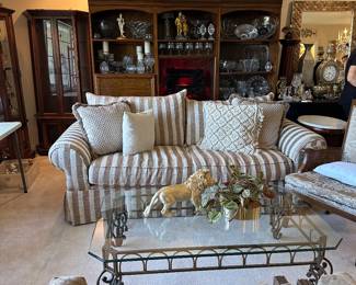 Beautiful striped sofa, neutral, color, and great condition. Coffee table and matching end tables.