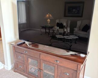 65 " Samsung Smart TV and media console cabinet - Also a 55" Samsung is also available