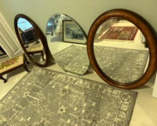 3 styles of oval mirror shown with NEW Pottery Barn area rug