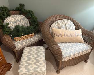 Wicker armchairs with cushions and ottoman