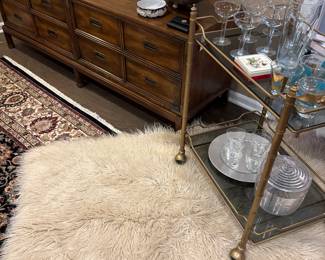 Alpaca area rug, vintage bar cart with smoked glass, and MCM console cabinet, MCM metal dishes and more!