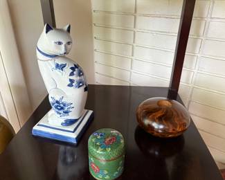 Delft cat, cloisonne jar, and wood candle holder
