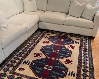 Burton James sectional sofa and 100% wool rug