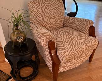 Uphostered Accent chair, wood black side table and brass vase