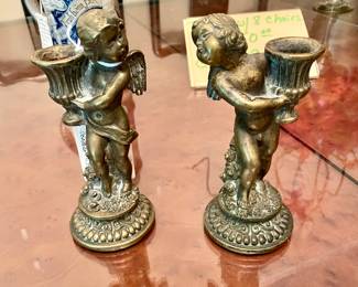 Pair of French Louis XV bronze candlesticks, girl and boy cherubs, throwing a kiss,