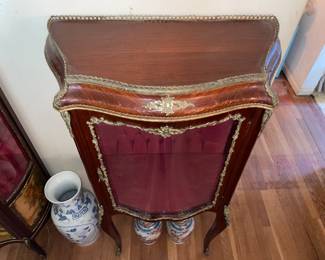 Antique Wooden Display Cabinet W/ Glass Door, Gold Metal Trim, & Red Upholstered Interior