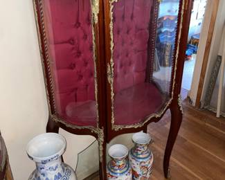Antique Wooden Display Cabinet W/ Glass Door, Gold Metal Trim, & Red Upholstered Interior
