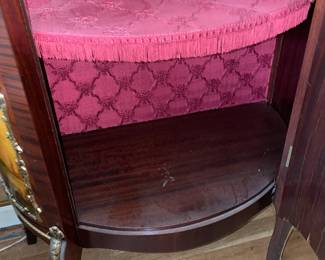 Antique Wooden Display Cabinet W/ Glass Door, Gold Metal Trim, Red Upholstered Interior, & Hand Painted Scene