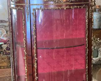 Antique Wooden Display Cabinet W/ Glass Door, Gold Metal Trim, Red Upholstered Interior, & Hand Painted Scene