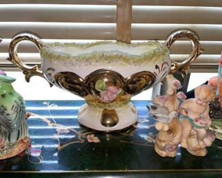 Cherub W/ Bird Figurine