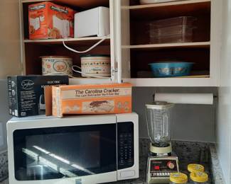 Microwave oven, blended, crock pots, knife sharpener and pots.