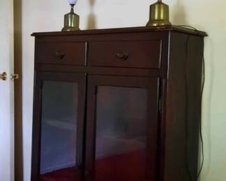 Glass cabinet.  Glass table lamps