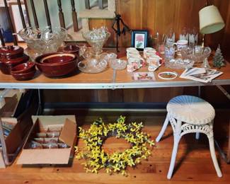 Crystal punch bowl, brown bean pot and matching dishes,  Christmas china, door wreath, lots of crytal.