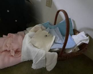 Vintage baby clothes with basket