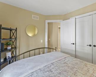 Crate and Barrell bed (headboard, footboard, and frame with or w/o mattress and boxspring). Side table, lamps, mirror, and Ethan Allen shelf also for sale.