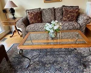 Living room sofa, "Ducks Unlimited" wood, iron, glass-top coffee table and side table.
Rug and lamps also for sale.