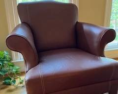 Chair and matching ottoman for sale.