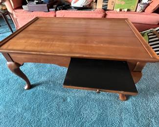 Wood coffee table with pull out trays.....