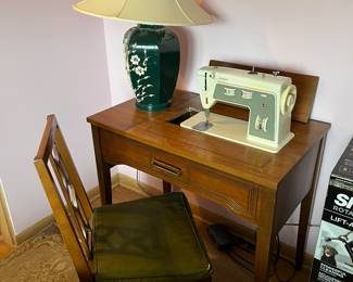 Vintage Singer sewing machine model 774 and cabinet......