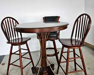 30) High end burled high top table and two cherry swivel bar stools.  Great for the two of you.  
