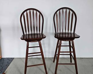 30) Two cherry swivel bar stools.  Great for the two of you.  
