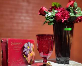 Red glass vase, goblet and candy box.