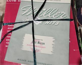 Bundle of sheet music.