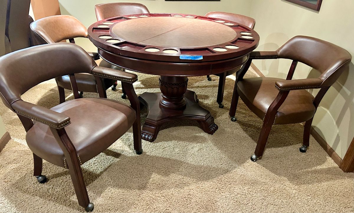 Solid round wood pedestal, Clawfoot Table with Poker table removable top (50.5rndx30”h)
& 5 caster arm chairs with grommet accents
$650 (7pcs)