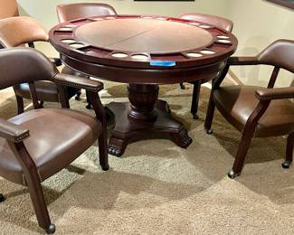 Solid round wood pedestal, Clawfoot Table with Poker table removable top (50.5rndx30”h)
& 5 caster arm chairs with grommet accents
$650 (7pcs)