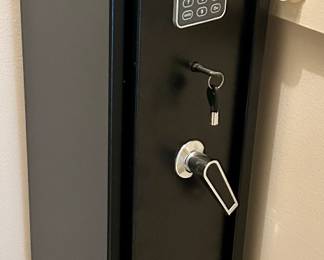 Tall & narrow gun safe 9” x 10” x 52”h with battery operated key pad $150