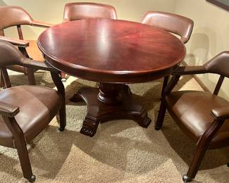 Solid round wood pedestal, Clawfoot Table with Poker table removable top (50.5rndx30”h)
& 5 caster arm chairs with grommet accents
$650 (7pcs)