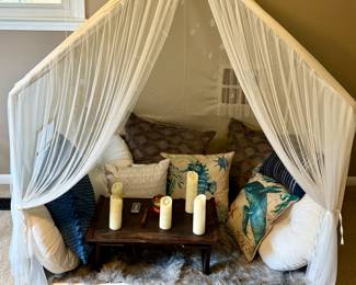 Indoor Meditation Tent with lights, pillows, table and candles