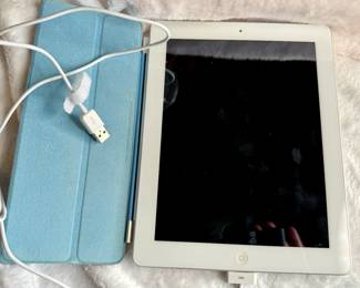 iPad 32 GB (unlocked) with case and charge cord