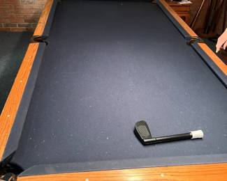Brunswick slate pool table with accessories. Leather pockets, wood trim, and dark felt top. Buyer to handle removal.