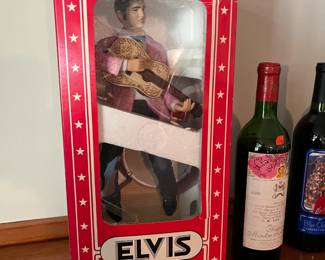 Limited edition Elvis decanter from McCormick Distilling Co. Features Elvis in a pink suit, complete in original box.
