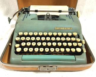 4019 - Smith-Corona Portable Typewriter in Case 6" x 13" x 14"