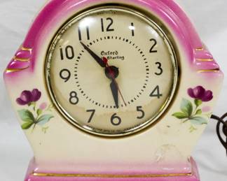 568 - Vintage Oxford Self Starting Porcelain Clock 8x6x2.5 You are buying a used as-is electric/electronic item. We do not guarantee all components are present, and if it is not expressly stated, it is untested.