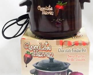 629 - Chocolate Heaven Fondue Pot with Box You are buying a used as-is electric/electronic item. We do not guarantee all components are present, and if it is not expressly stated, it is untested.