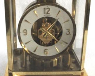 8158 - Le Couture Mantel Clock - 9" x 8" x 6" You are buying a used as-is item. We do not guarantee all components are present, and if it is not expressly stated, it is untested.