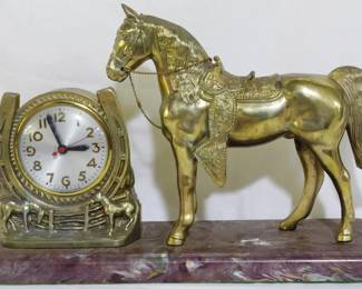 951 - Vintage Saddled Horse & Horseshoe Clock 11x17x5 You are buying a used as-is electric/electronic item. We do not guarantee all components are present, and if it is not expressly stated, it is untested.