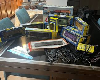 AHM trains and track with miscellaneous signs and accessories