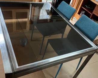 Glass table with extension to 6 ft with 4 turquoise chairs