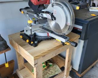 Table saw with stand on wheels