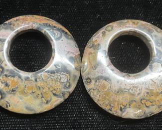 Pair Carved Round Stone Pendants