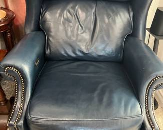 Studded leather armchair