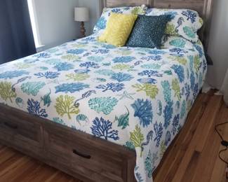 Queen bed; two storage drawers in foot of bed; three beds available