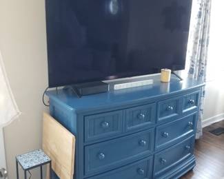 Nautical blue 6-drawer dresser has a matching mirror; flat screen TV