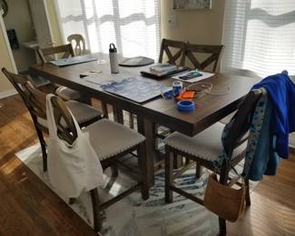 High top dining set seats 6; shown with leaves extended