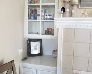 Built-in cabinetry matches kitchen cabinetry
