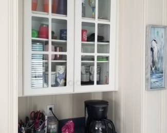 Kitchen includes glass front cabinetry